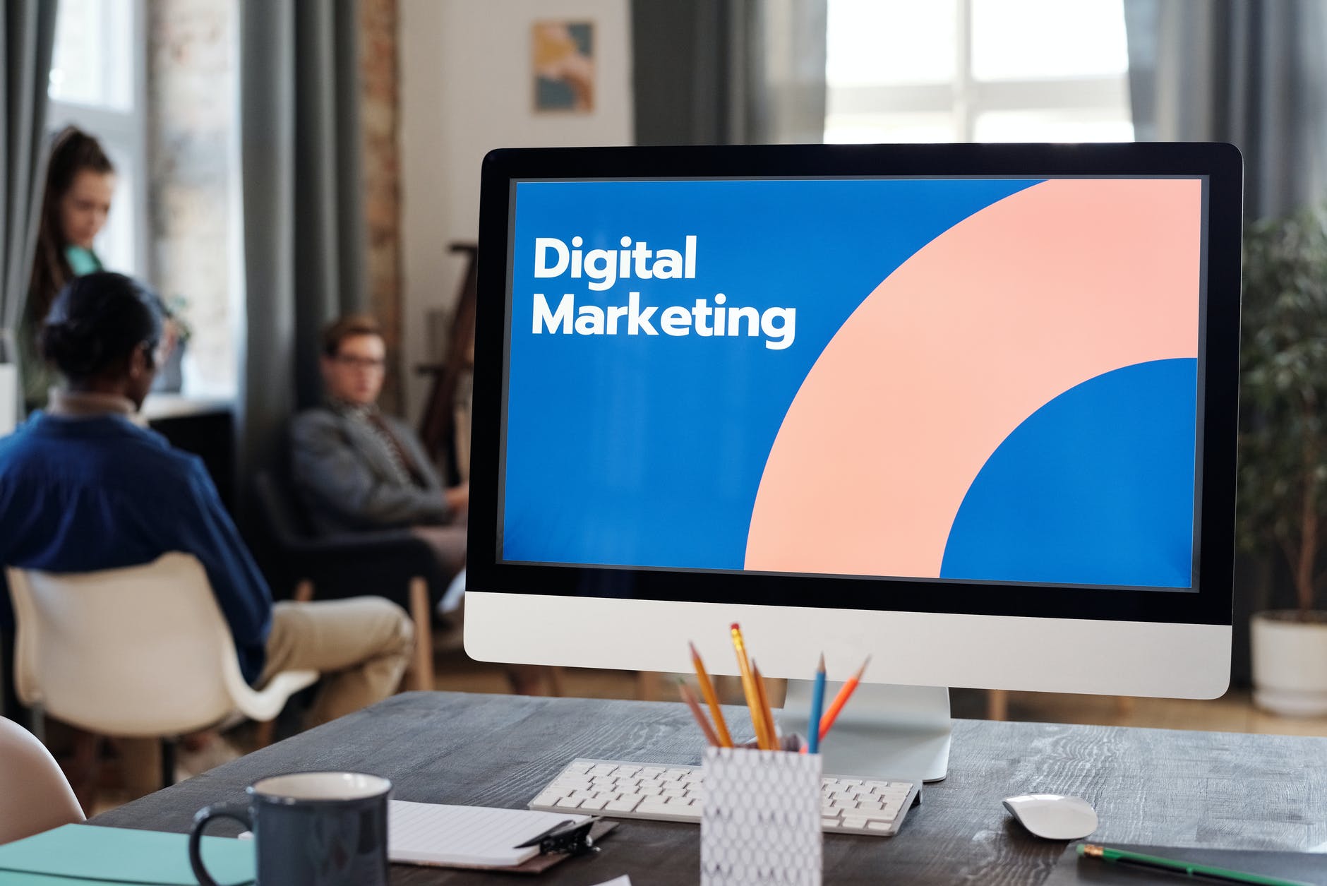 Tips and Strategies in Digital Marketing: Make Your Business Stand Out | silver imac on brown wooden table